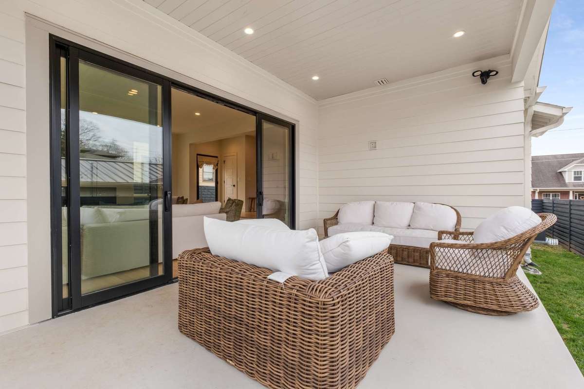 Outdoor main floor covered entertaining space.  Screen this in, or use it for additional outdoor leisure and dining