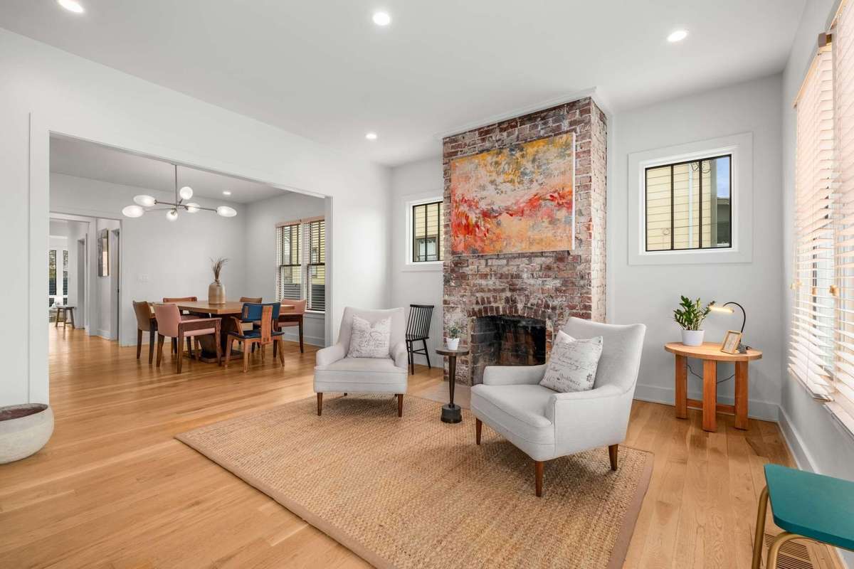 The front entry living space offers flexibility in floorplan - set up a welcoming entry formal living space, home office, or family friendly flex space.