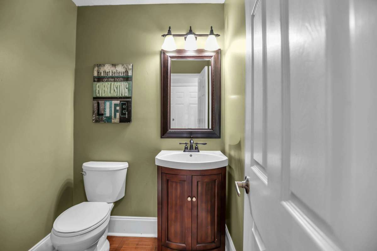 1/2 Bath conveniently located downstairs.