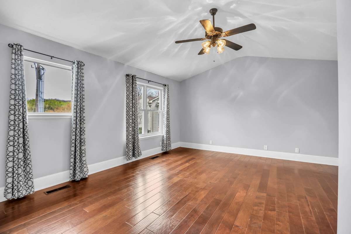Spacious Primary Bedroom is located just a few steps up from 2nd Family Room.