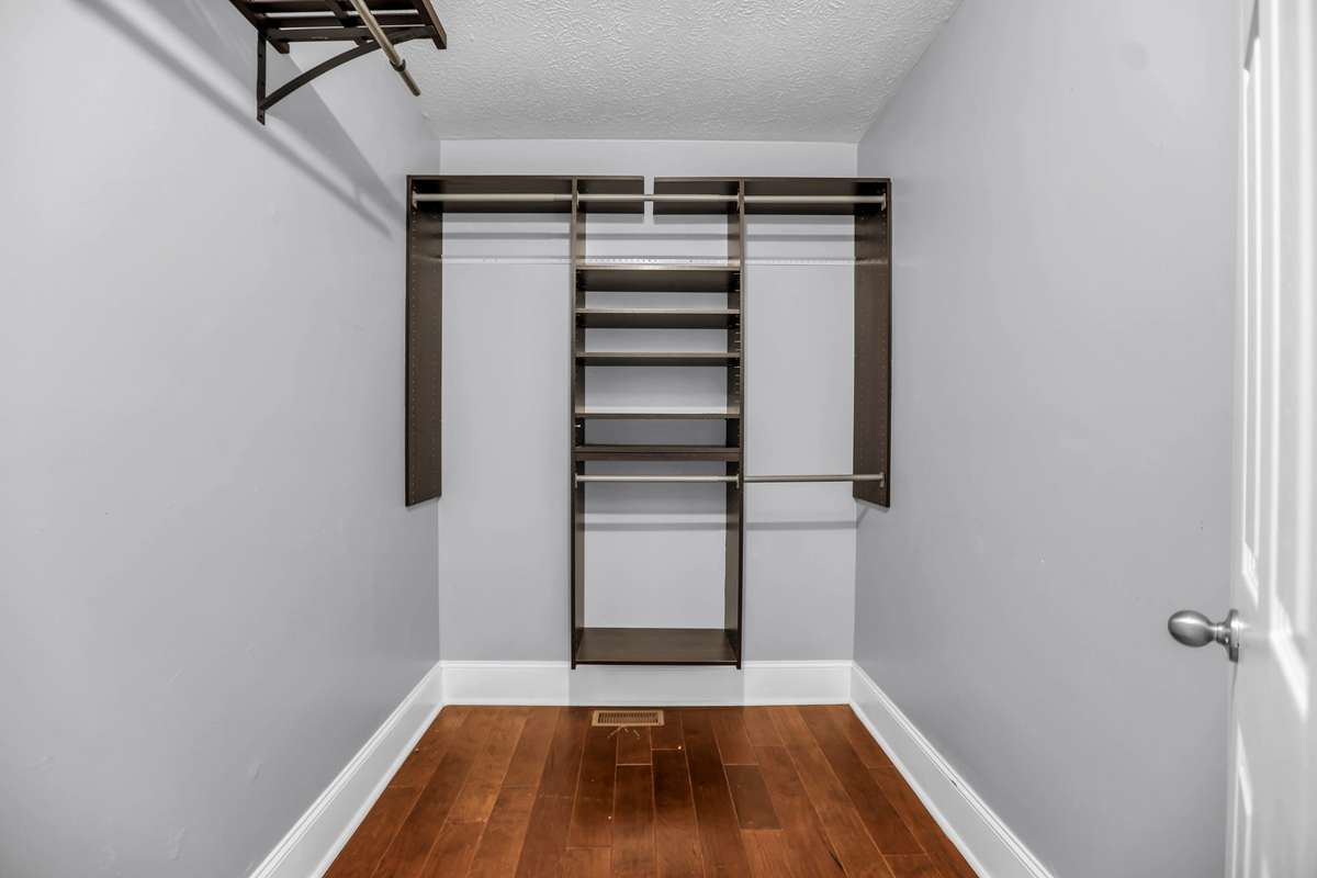 Primary Bedroom Walk-In Closet.