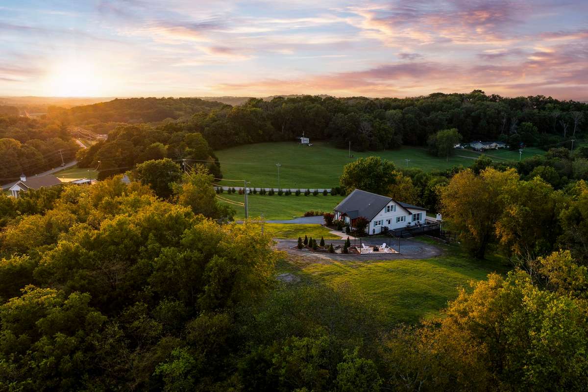 2700 Clayton Arnold Road is a serene retreat nestled on just under seven acres of rolling Tennessee hills in the heart of Thompson’s Station.
