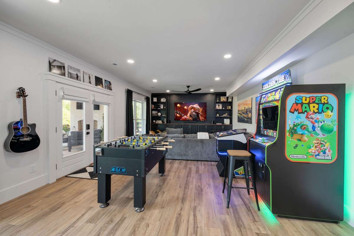 The fully finished walk-out basement expands the home’s versatility with a second full kitchen, spacious living and dining areas, game room, office nook, two flex spaces, and a full bath—ideal for guests, multigenerational living, or entertaining.