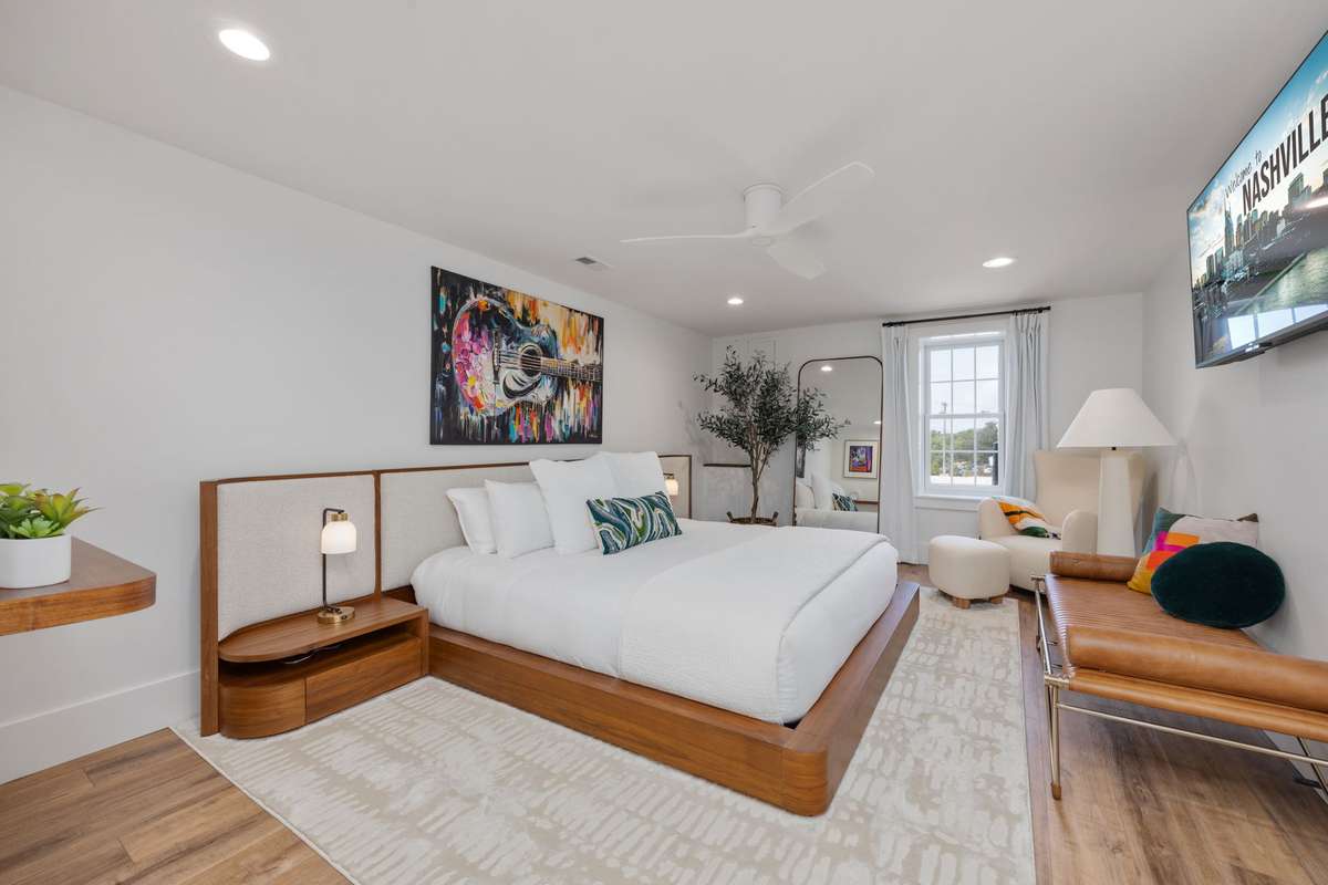 Guitar wall art above bed does not remain.