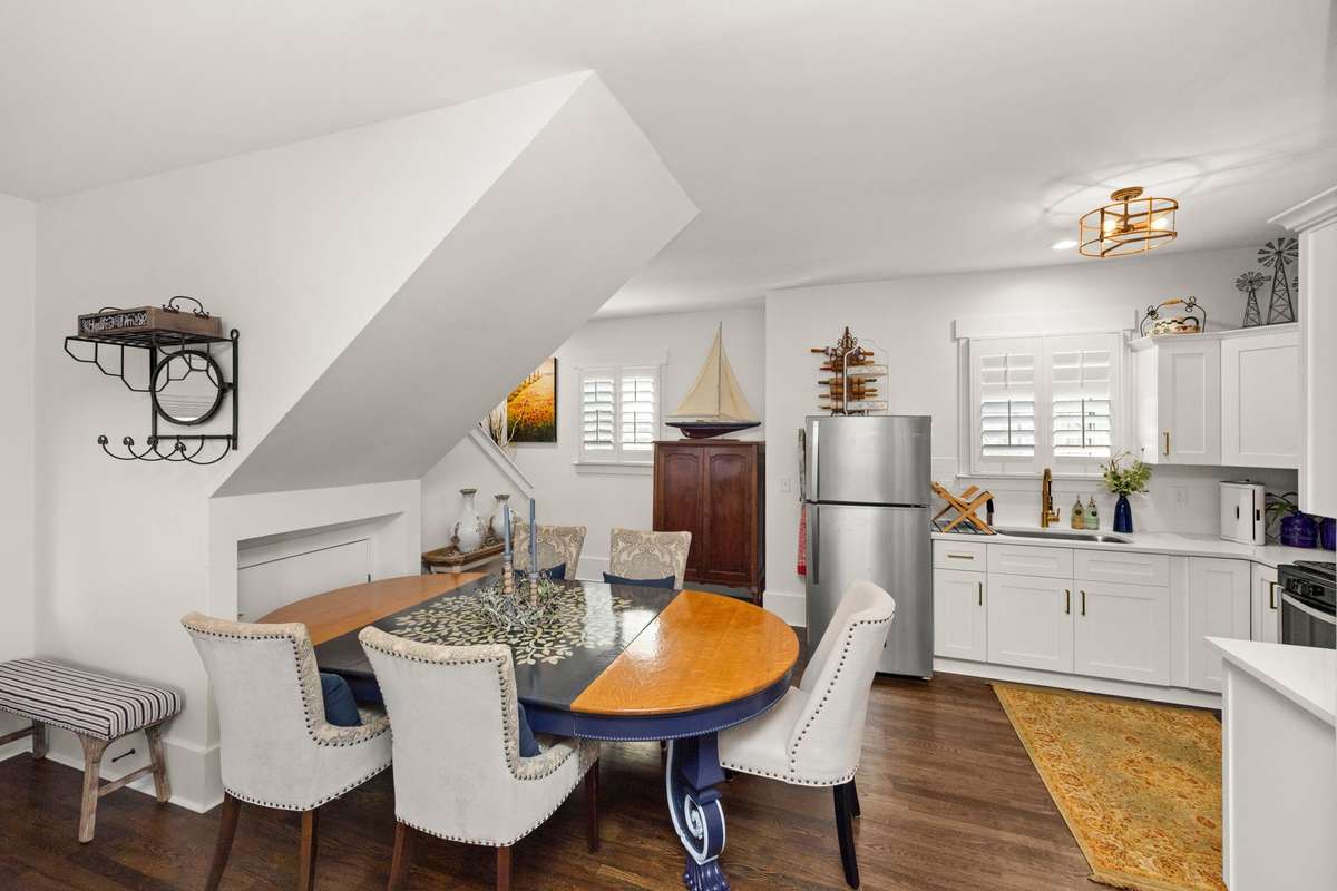 Separate In-Law Quarters. Private Entrance. Secondary Living Area. Secondary Full Kitchen. Secondary Laundry Room. Half Bathroom Downstairs. Private Bedroom & Full Bathroom Upstairs. Connected to Main Living Area through Upstairs Hallway.