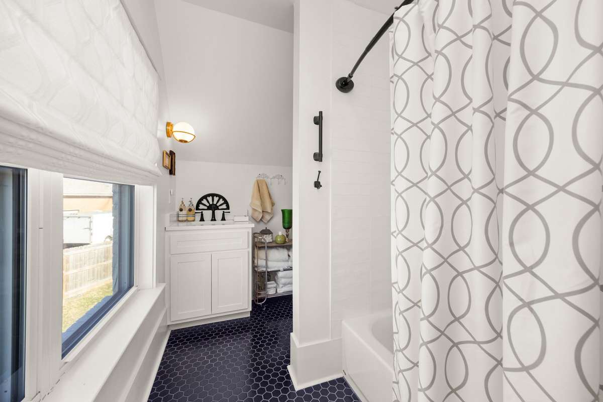 Separate In-Law Quarters. Private Entrance. Secondary Living Area. Secondary Full Kitchen. Secondary Laundry Room. Half Bathroom Downstairs. Private Bedroom & Full Bathroom Upstairs. Connected to Main Living Area through Upstairs Hallway.