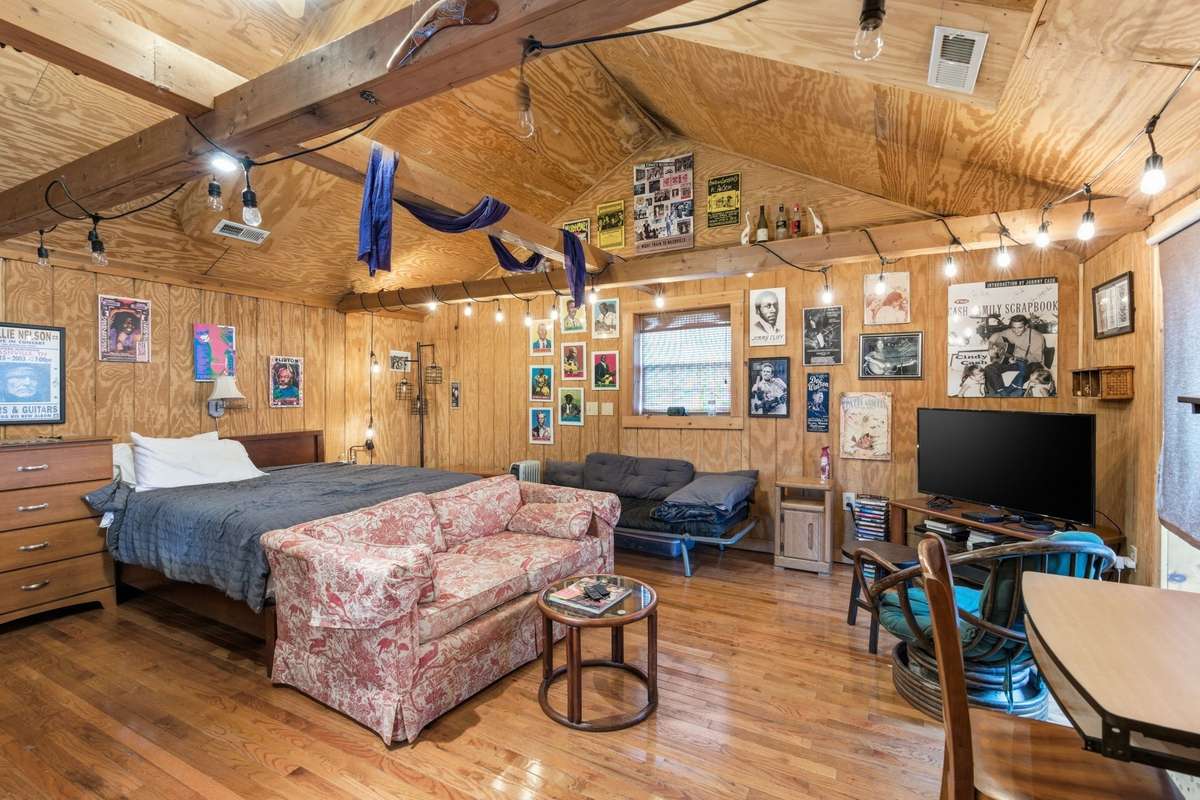 The rear studio apartment offers opportunity for extra income, a place to live while renovating, or turn it into a music studio or hobby space!