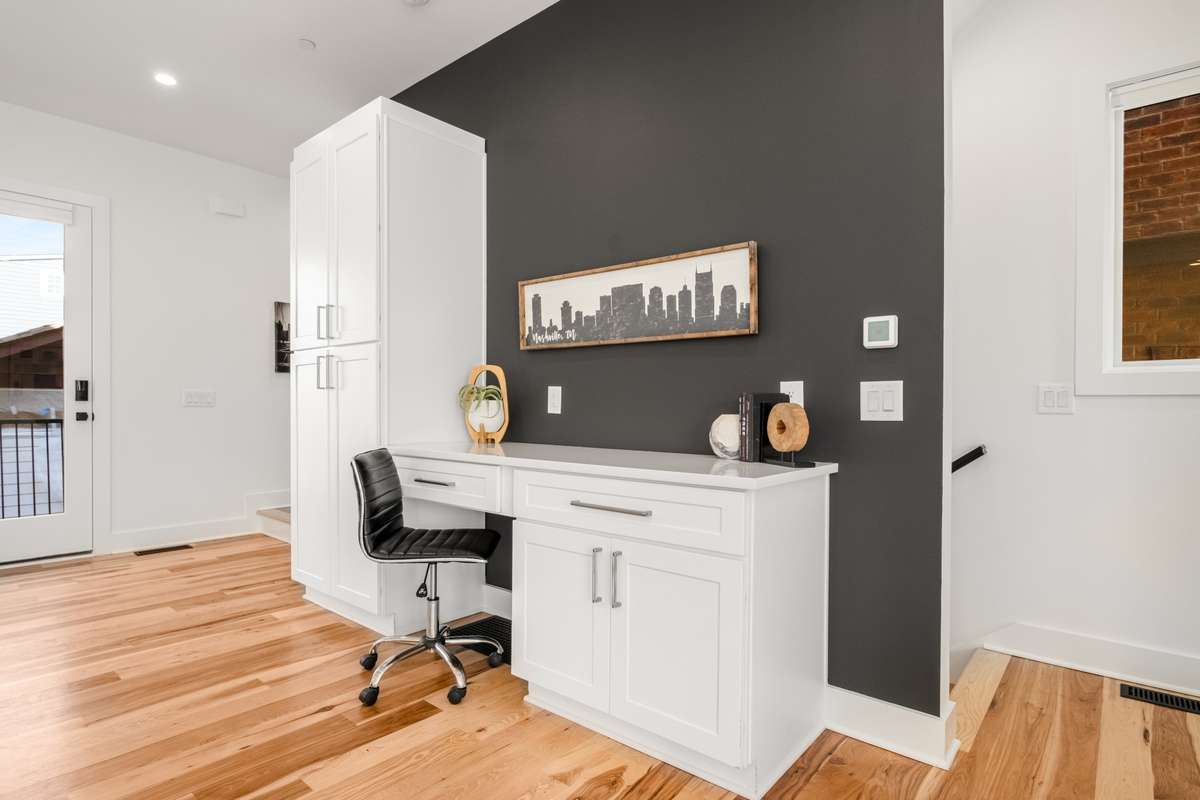 Elegant and practical, a workspace just off the kitchen makes working from home a breeze.