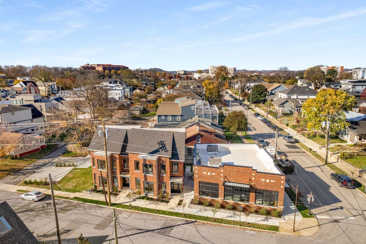 From above, note the corner future retail site, along with townhomes A and B, and the lot for a future third townhome. Invest now to build your equity in this growing neighborhood!