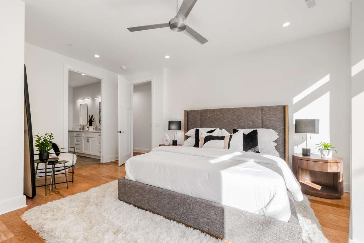 Accented by large windows and 9 ft ceilings, this bedroom also offers an elegant ensuite bathroom and a large walk-in closet with washer/dryer hook-ups.