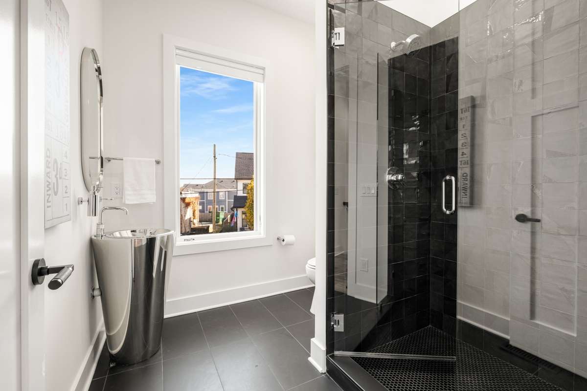 The main floor of the home is complete with this full bathroom.