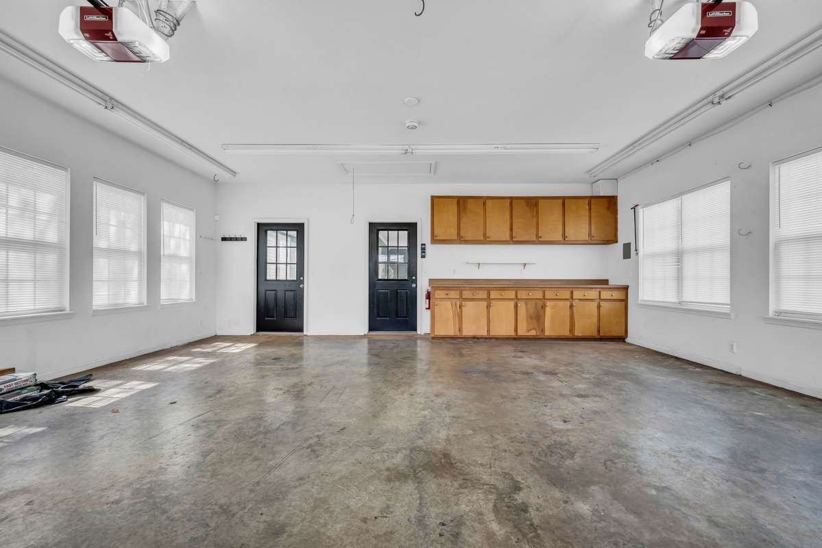 GARAGE OF YOUR DREAMS w/ Workshop/Storage Area