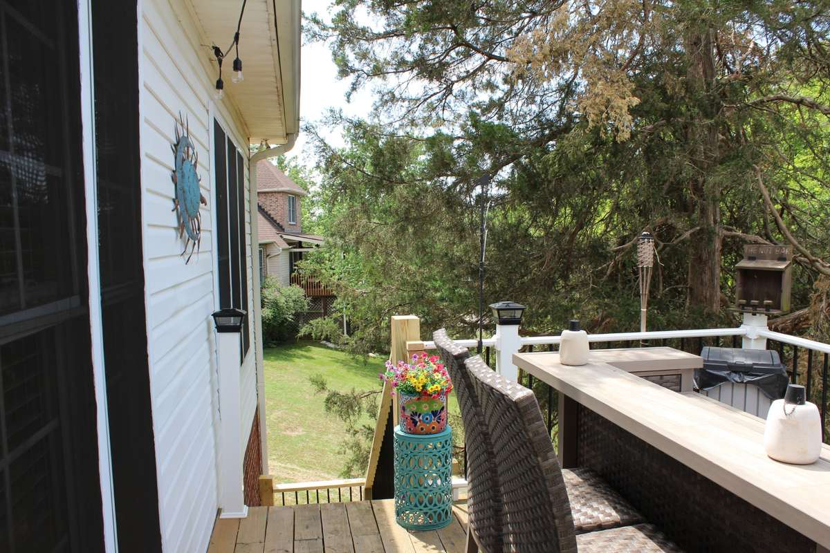 Sellers have just installed steps from deck to the yard for easy access.