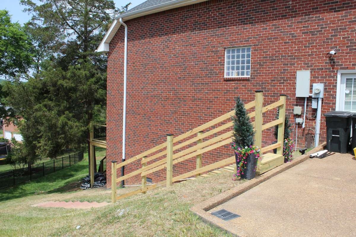 New stairs built to access yard from side yard also.