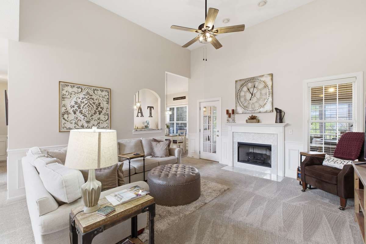 Light and airy family room overlooking the three season room.