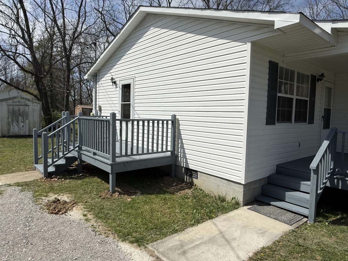 Side porch and front entrance steps