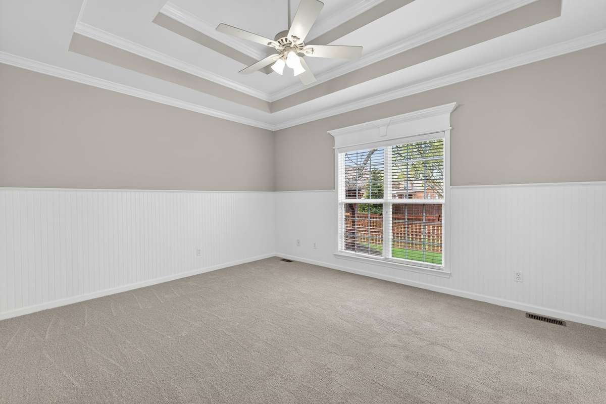 Primary bedroom is spacious.