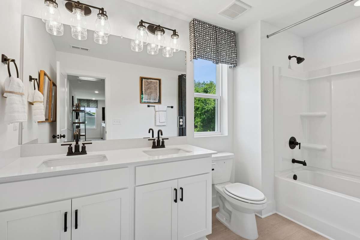 Home is under construction and all pictures are of a completed Whitley plan in a different community so finishes will vary.