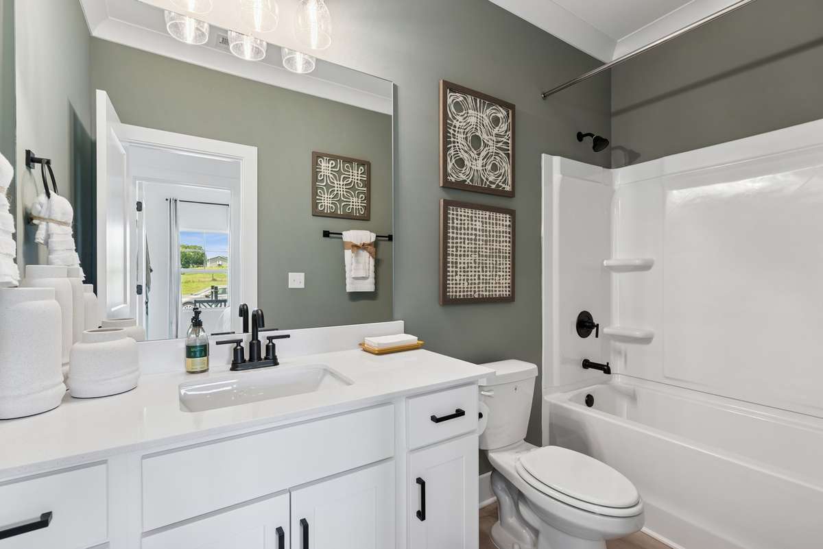 Home is under construction and all pictures are of a completed Whitley plan in a different community so finishes will vary.