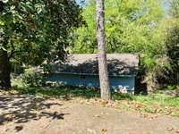 Carport in back yard.