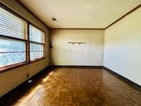 Living room with parquet flooring.
