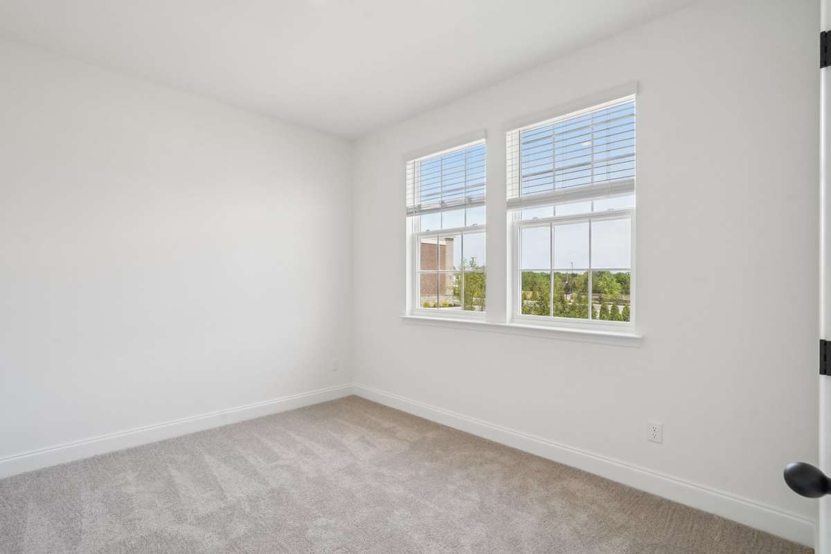 Bedroom 3 is conveniently located upstairs, offering privacy and easy access to a shared bathroom.