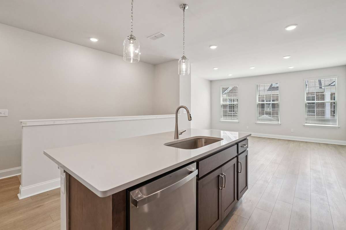 Durable LVP flooring flows throughout the main living area, providing an elegant appearance with easy maintenance and lasting performance.