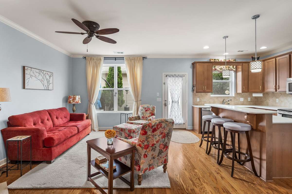 Kitchen and living room with door to rear courtyard