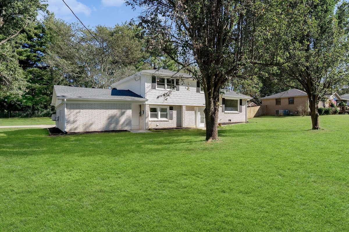 Home sits on a beautiful corner lot.