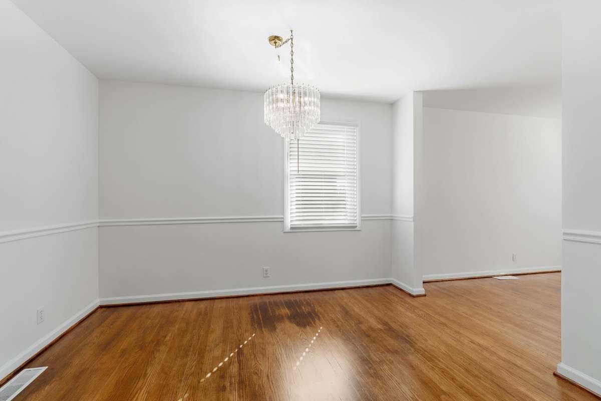 Photo is from the kitchen, looking into the dining room.