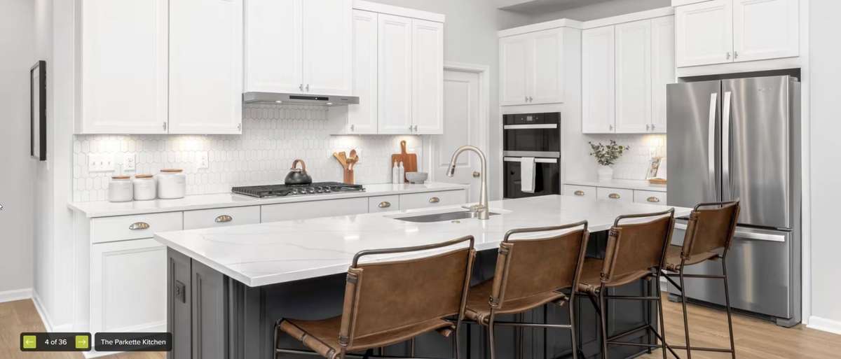 Not actual home. Photo of plan in another state and showing optional features and upgrades