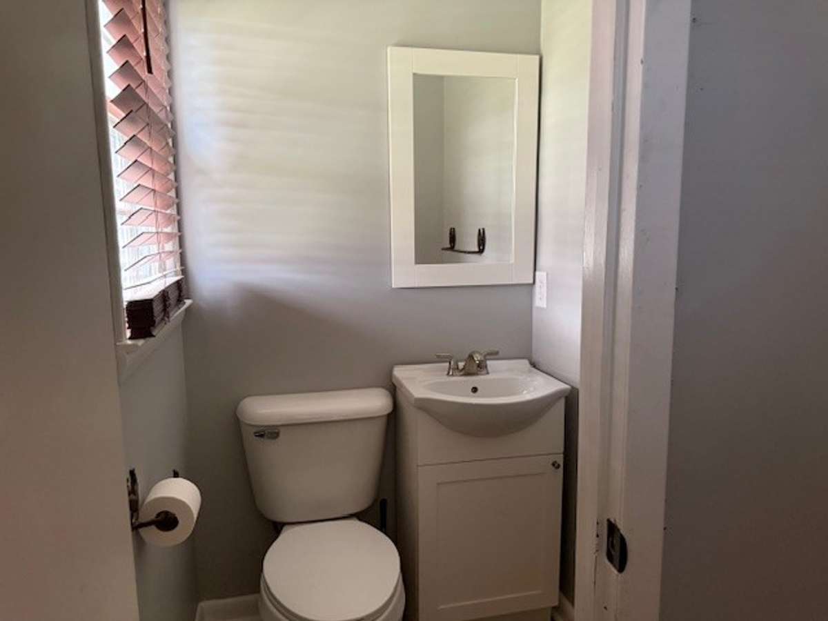 The half bathroom is in bedroom number two.
