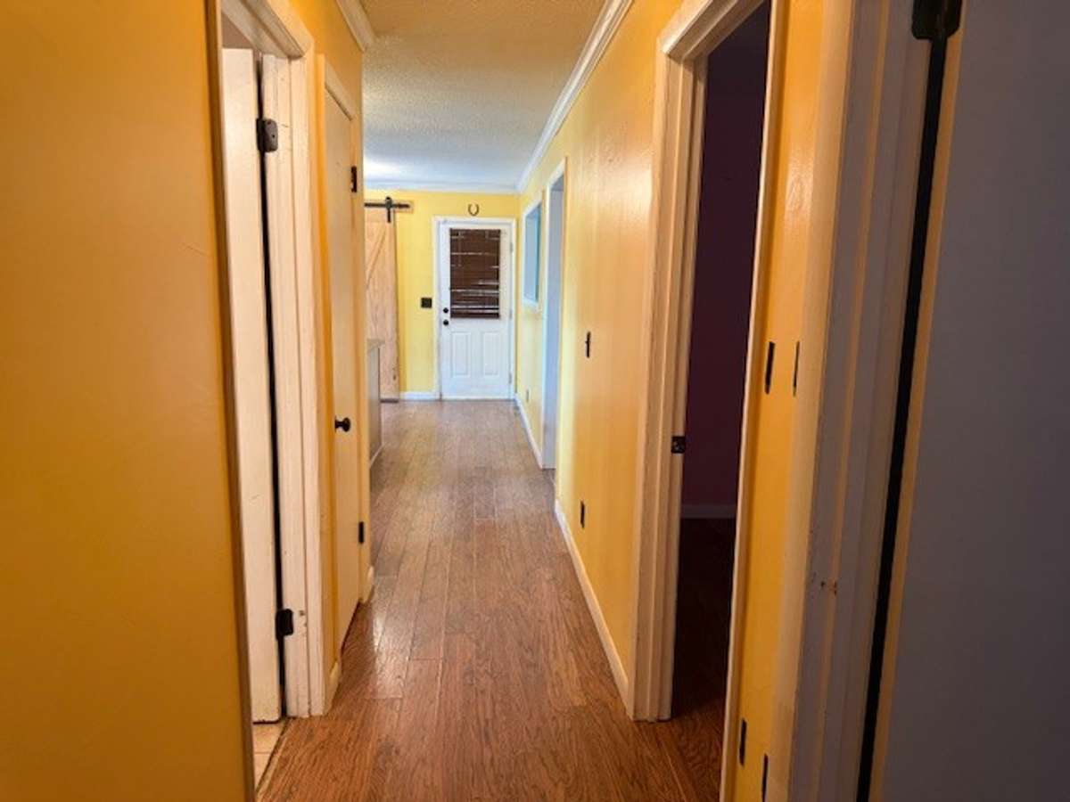 View of the kitchen from the hallway.