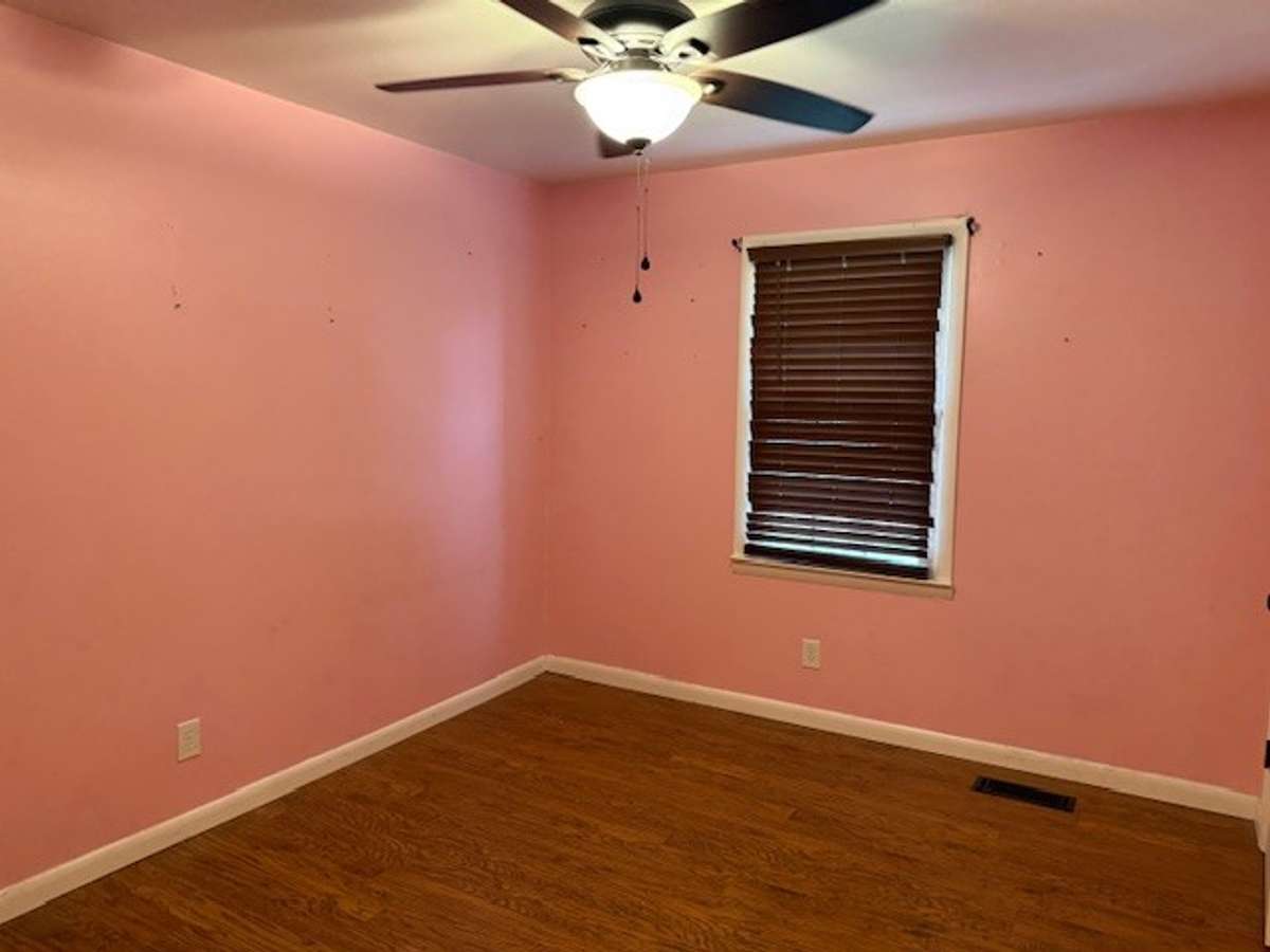 The first of three bedrooms.