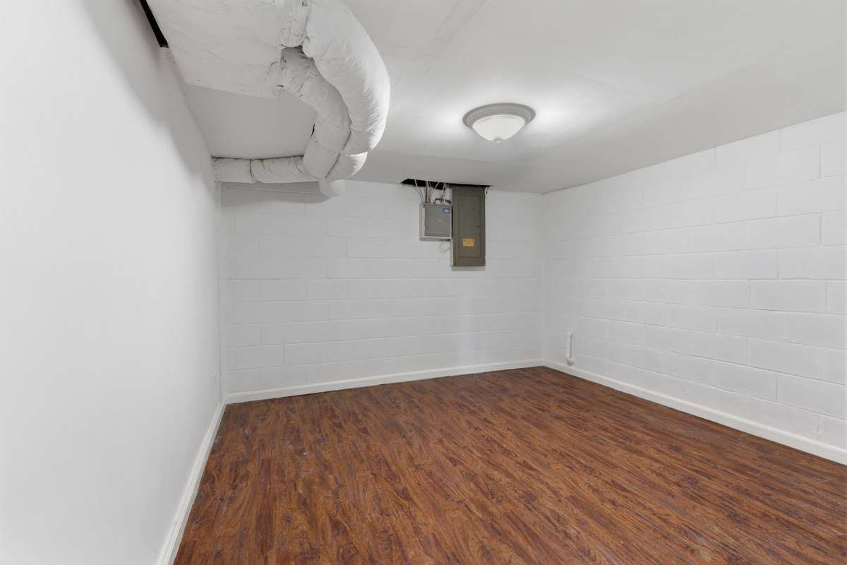 An additional room downstairs perfect for a hobby room or extra storage.