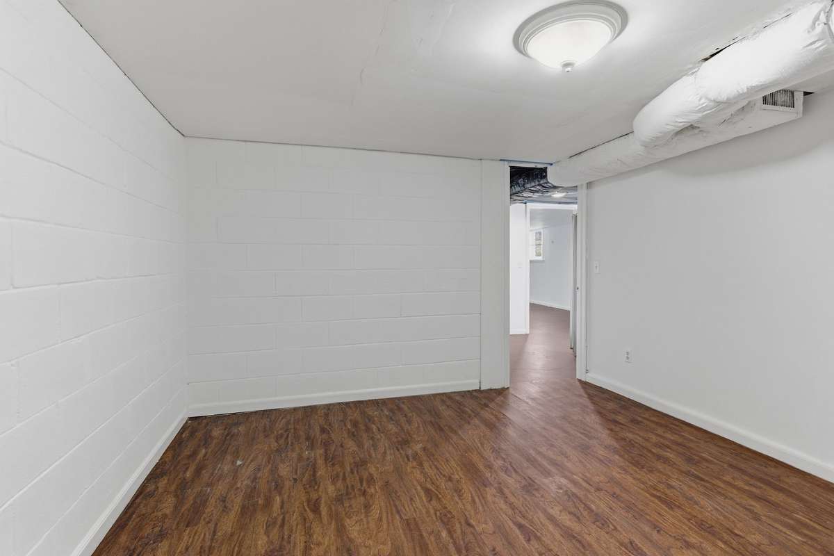 Another view of the additional room downstairs.