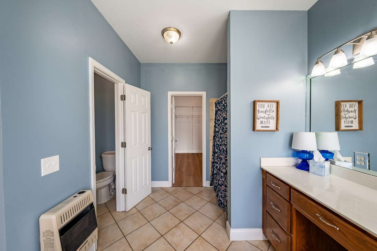 Primary bath has a backup gas wall heater