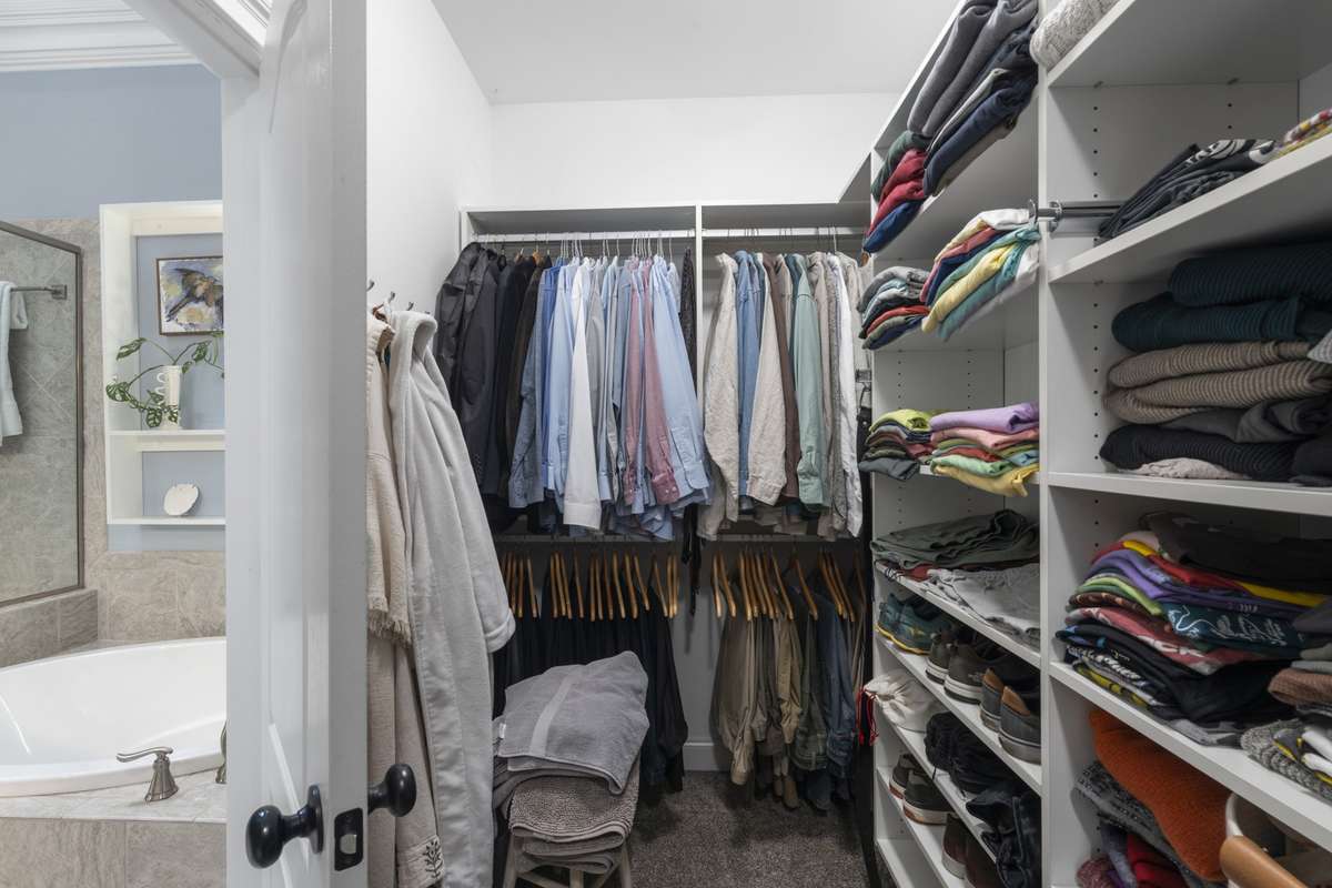 Part of the spacious primary closet.