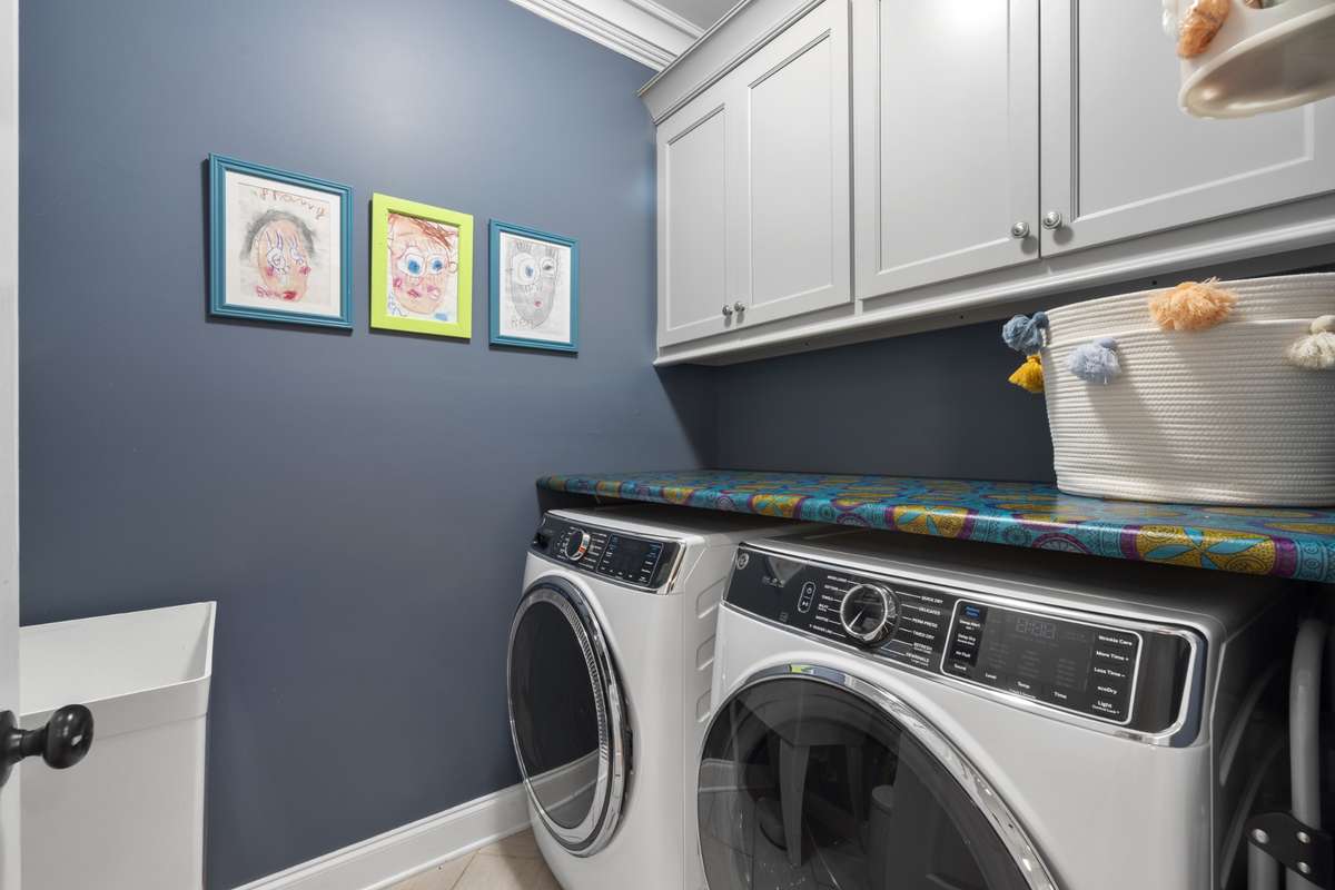 A spacious laundry room adjacent to the kitchen.