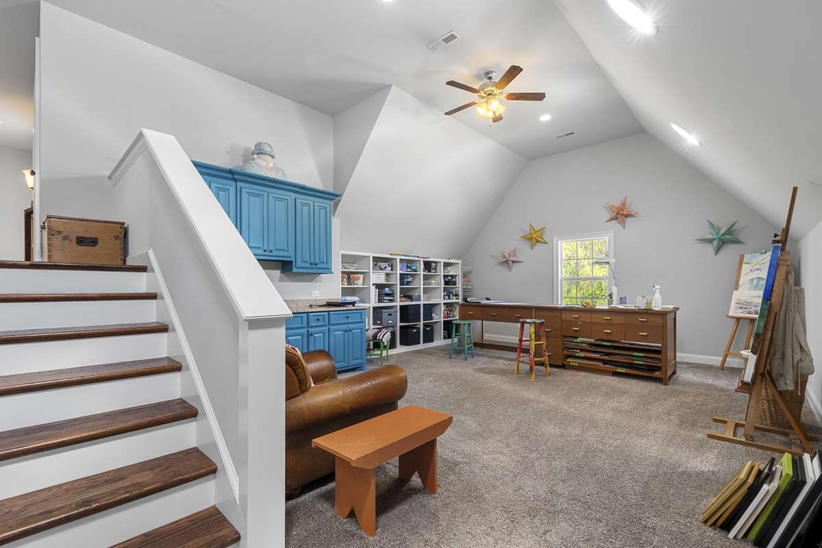 So many options for this roomy space - a theatre room, home gym or studio.