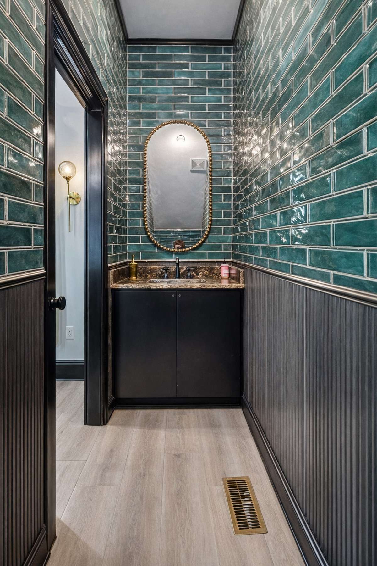 Thoughtfully designed half bath conveniently located on the primary level.