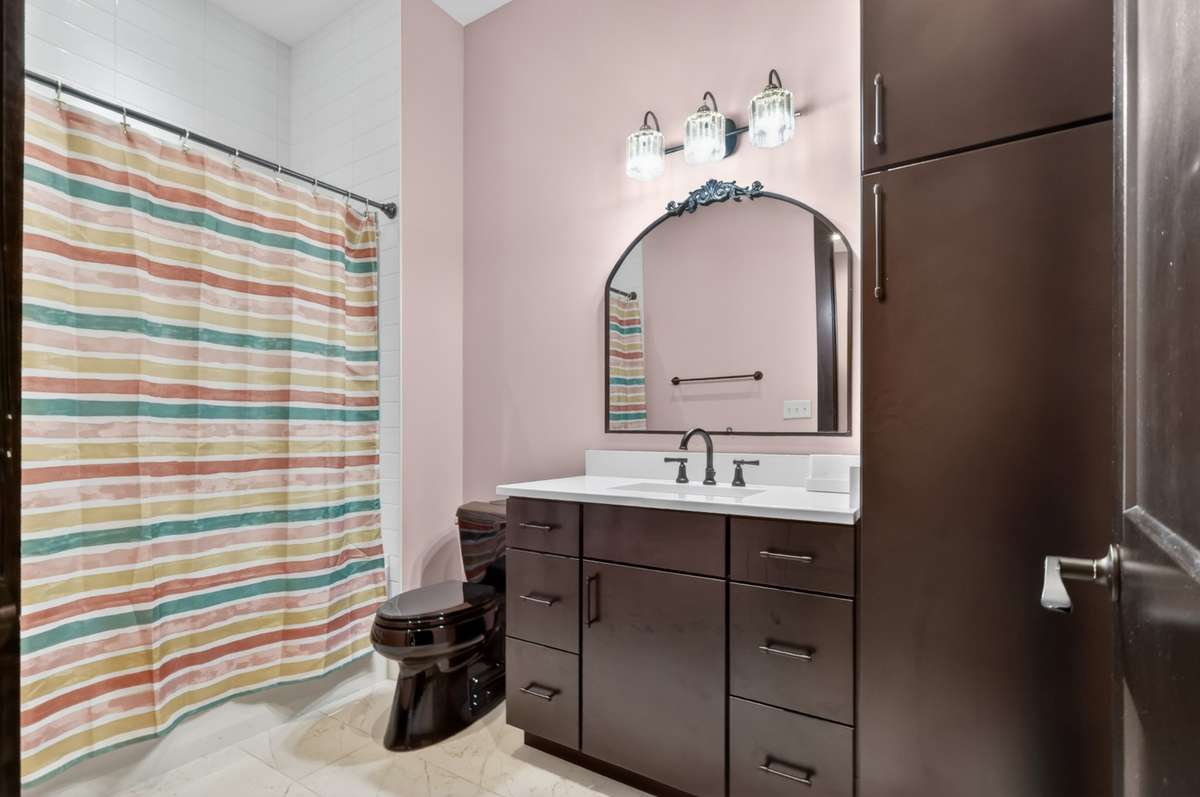 Second bedroom includes a full en-suite bath.