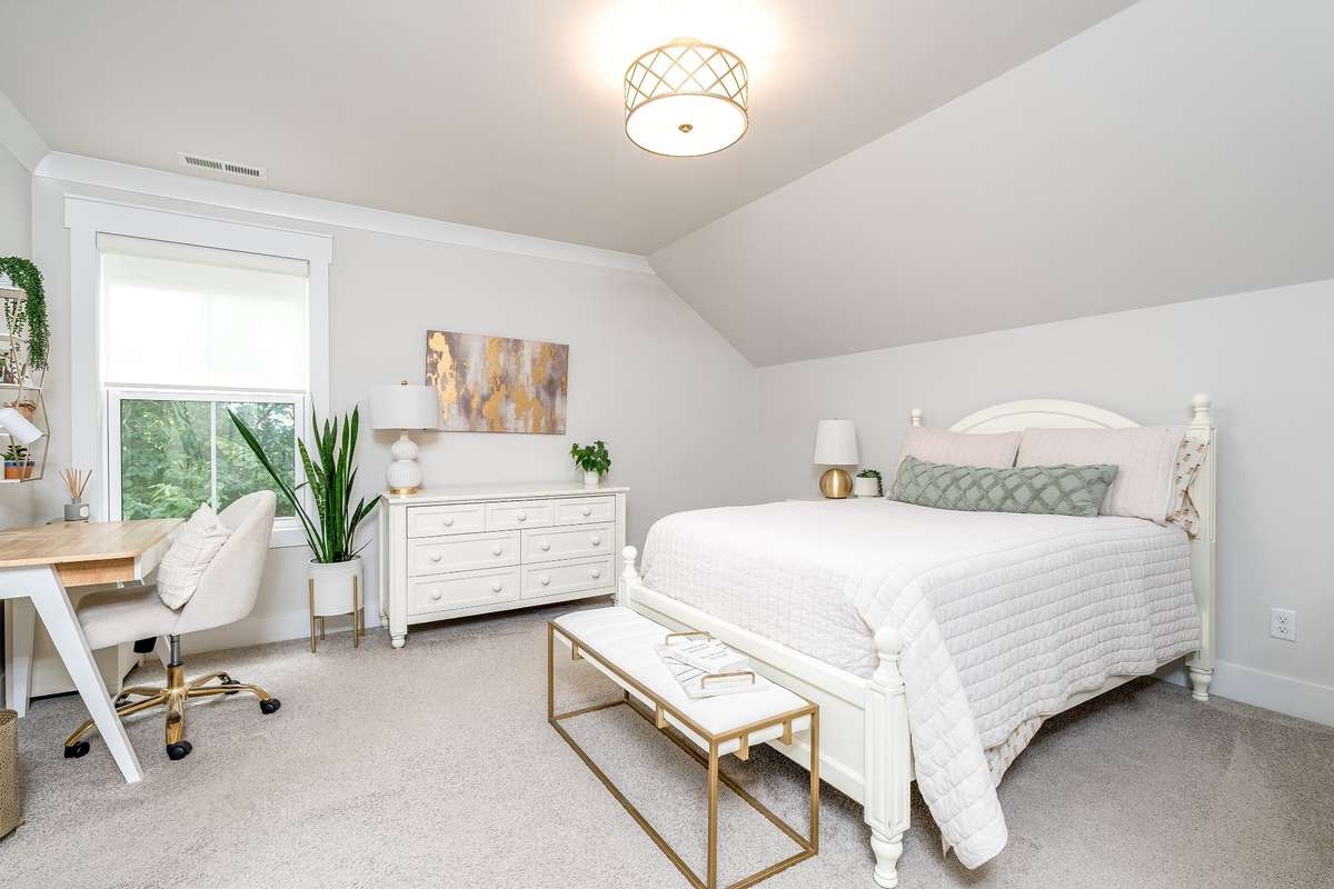 Secondary Bedroom #2 is located upstairs and  has it's own full bath