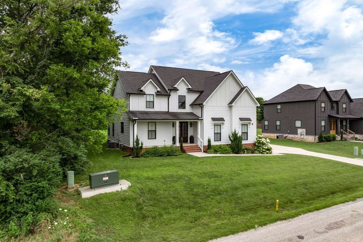 Plush landscaping, Green Grass and complete privacy on one side and the back