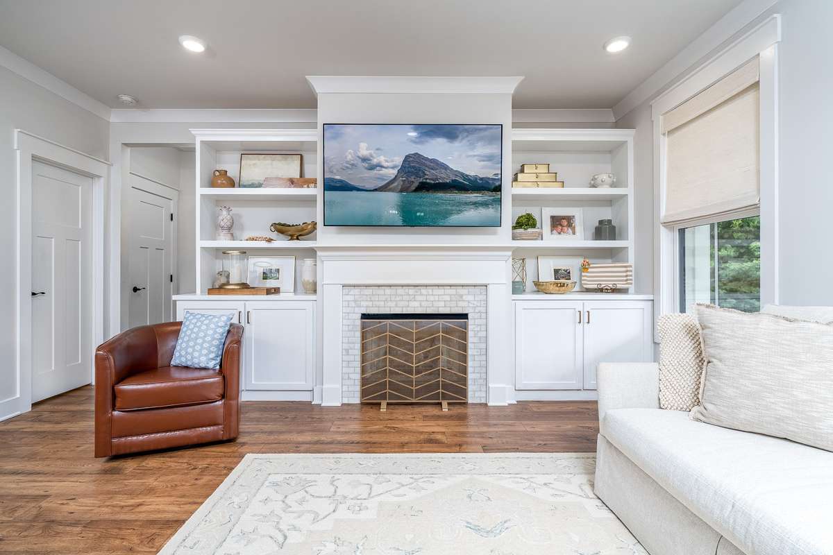 Display all your favorite things in your custom cabinets. Flip the switch to turn on gas logs