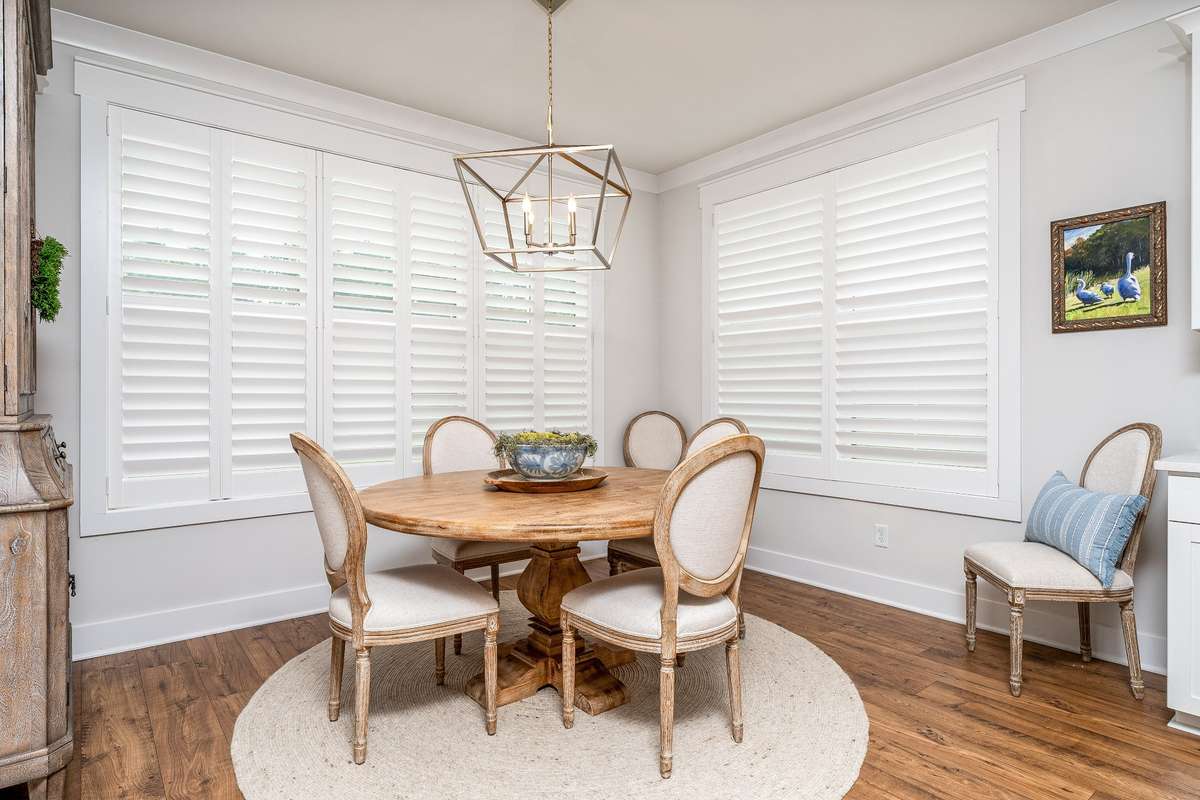 Imagine the view sitting here enjoying your morning coffee overlooking your level-tree lined back yard