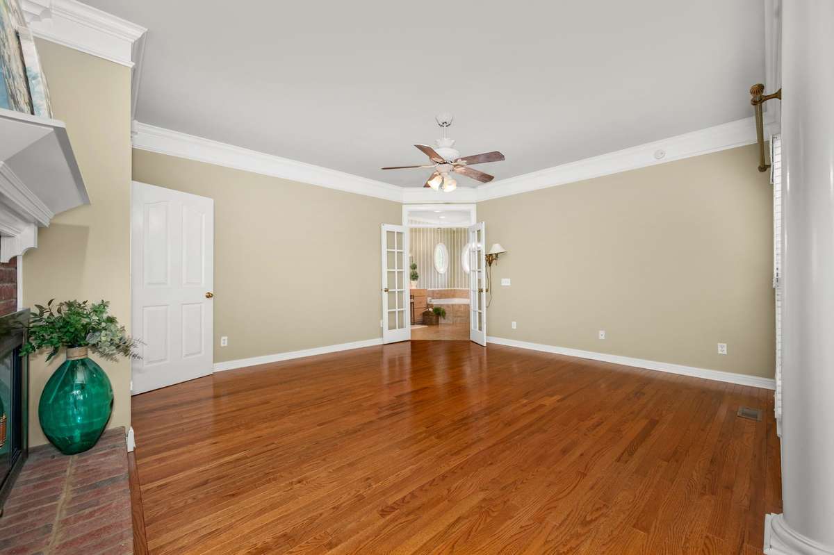 Double doors lead into the owner's bathroom.