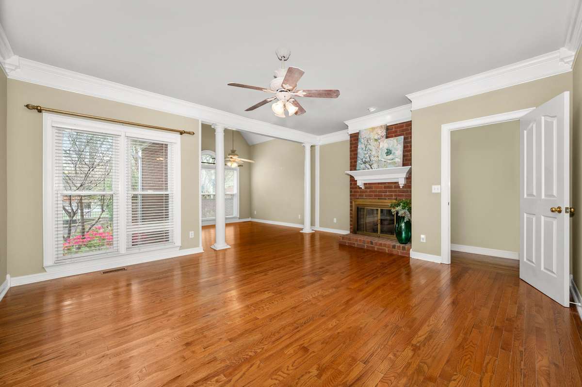 Imagine winters in this first floor primary suite with sitting area.