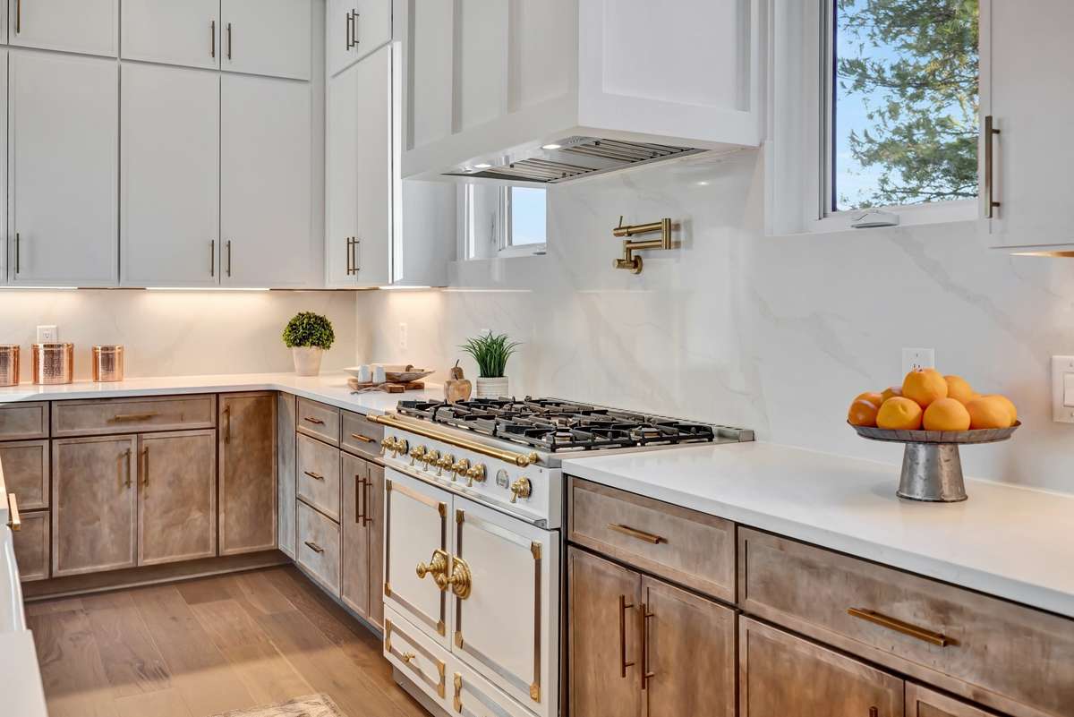 Countertops and Backsplash blend together for a clean and orderly workspace