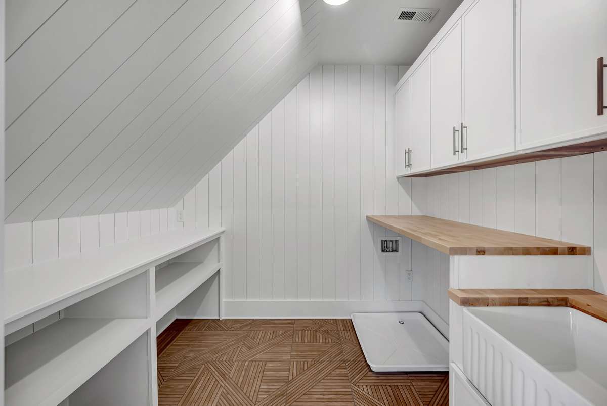 Upstairs Laundry w storage and laundry sink